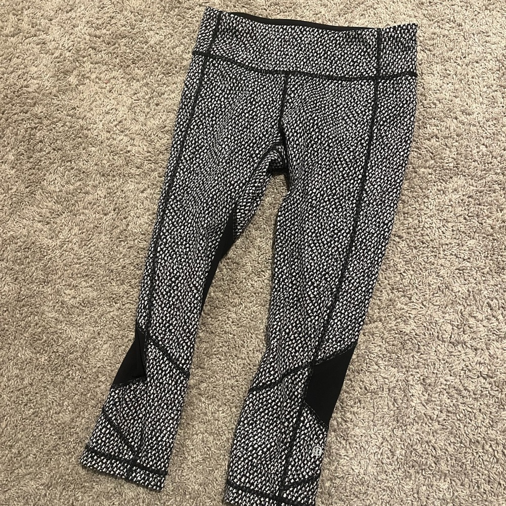 Lululemon size 6 cropped leggings with pocket in back! Like new!